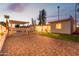 Large paver patio and synthetic lawn enhance the backyard of this well kept home at 4033 W Sharon Ave, Phoenix, AZ 85029