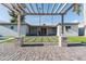 Paver patio and synthetic lawn enhance the curb appeal of this attractive home at 4033 W Sharon Ave, Phoenix, AZ 85029