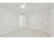 Clean bedroom featuring tile floors, white walls, closet, and natural light at 4410 N 20Th Ave, Phoenix, AZ 85015