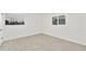 Cozy bedroom featuring tile floors, white walls, and natural light at 4410 N 20Th Ave, Phoenix, AZ 85015