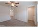 Spacious bedroom with neutral walls, carpet, and a ceiling fan at 46 S 96Th St, Mesa, AZ 85208
