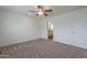 Spacious carpeted bedroom with an ensuite bathroom at 46 S 96Th St, Mesa, AZ 85208