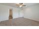 Spacious carpeted bedroom with an ensuite bathroom at 46 S 96Th St, Mesa, AZ 85208