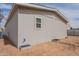 A view of a low-maintenance exterior with fresh gravel landscaping around the home at 46 S 96Th St, Mesa, AZ 85208