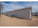 The exterior of the home with gravel landscaping and an AC unit for a tidy look at 46 S 96Th St, Mesa, AZ 85208