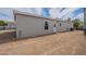 Exterior view with a back entrance and newly landscaped gravel providing modern charm at 46 S 96Th St, Mesa, AZ 85208