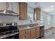 This kitchen features stainless steel appliances, a modern sink, and plenty of counter space at 46 S 96Th St, Mesa, AZ 85208