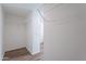 An organized, bright walk-in closet offering lots of storage space with white wire shelving at 46 S 96Th St, Mesa, AZ 85208