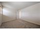 Bedroom with plush carpeting, and a ceiling fan for added comfort at 4804 S 25Th Dr, Phoenix, AZ 85041