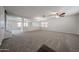 Inviting living room with neutral carpet and a flexible open-concept layout at 4804 S 25Th Dr, Phoenix, AZ 85041