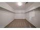 Walk-in closet with carpet and shelving for organized storage at 4804 S 25Th Dr, Phoenix, AZ 85041
