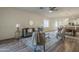 Spacious living room flows into dining area with open concept, perfect for entertaining at 5096 S 245Th Dr, Buckeye, AZ 85326
