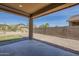 Covered patio area with a view of the backyard, ready for outdoor enjoyment and relaxation at 5096 S 245Th Dr, Buckeye, AZ 85326