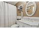 Bathroom with a walk-in shower, marble vanity and an oval mirror at 5154 N 83Rd St, Scottsdale, AZ 85250