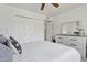 Bedroom with bed, dresser, and closet at 5154 N 83Rd St, Scottsdale, AZ 85250