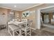 Bright dining room featuring white table, decorative wall art, and modern decor at 5154 N 83Rd St, Scottsdale, AZ 85250