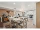 Open-concept kitchen and dining area featuring updated appliances and modern decor at 5154 N 83Rd St, Scottsdale, AZ 85250