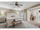 Spacious bedroom with a ceiling fan, carpet flooring, and a walkout patio at 5154 N 83Rd St, Scottsdale, AZ 85250