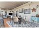 Charming covered patio with comfortable seating, stylish decor, and a refreshing drink cooler for outdoor enjoyment at 5154 N 83Rd St, Scottsdale, AZ 85250