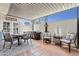 Covered patio with tile flooring and outdoor dining furniture at 5154 N 83Rd St, Scottsdale, AZ 85250
