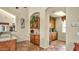 Inviting bar area with a sink, microwave, and cabinetry for storage at 5335 E Shea Blvd # 1094, Scottsdale, AZ 85254