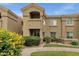Well-maintained condo exterior with lush landscaping and attractive architectural details at 5335 E Shea Blvd # 1094, Scottsdale, AZ 85254