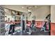 Well-equipped fitness center with various workout machines and rubber flooring at 5335 E Shea Blvd # 1094, Scottsdale, AZ 85254