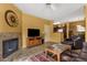 Inviting living room with fireplace, tiled floors and comfortable seating at 5335 E Shea Blvd # 1094, Scottsdale, AZ 85254