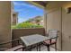 Private patio with a table and chairs, perfect for outdoor relaxation at 5335 E Shea Blvd # 1094, Scottsdale, AZ 85254