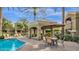 Community pool with covered seating area and well maintained landscaping at 5335 E Shea Blvd # 1094, Scottsdale, AZ 85254