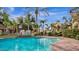 Beautiful community pool with fountains, palm trees, and well maintained landscaping at 5335 E Shea Blvd # 1094, Scottsdale, AZ 85254