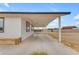Partial view of the backyard of the house, with a partial view of the covered patio at 546 N 96Th Pl, Mesa, AZ 85207