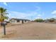 Exterior of a cozy one-story home with a spacious neutral front yard and freshly painted exterior at 546 N 96Th Pl, Mesa, AZ 85207