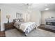 Spacious bedroom featuring a bed, bunk beds, nightstand, and white walls and ceiling at 6333 N Scottsdale Rd # 5, Scottsdale, AZ 85250