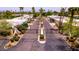 Gated community entrance showcasing well-maintained landscaping and secure access for residents at 6333 N Scottsdale Rd # 5, Scottsdale, AZ 85250