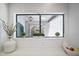 Bright kitchen featuring white subway tiles, quartz countertops, and modern decor at 6333 N Scottsdale Rd # 5, Scottsdale, AZ 85250
