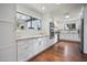 Bright kitchen with white cabinets, modern appliances, and a large window overlooking the outdoors at 6333 N Scottsdale Rd # 5, Scottsdale, AZ 85250