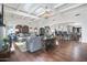 Open-concept living room featuring hardwood floors, high ceilings, and elegant decor at 6333 N Scottsdale Rd # 5, Scottsdale, AZ 85250