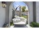 Charming patio featuring a cozy hanging swing chair, creating a serene and inviting outdoor retreat at 6333 N Scottsdale Rd # 5, Scottsdale, AZ 85250