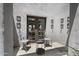 Charming patio area with wrought iron furniture, candle sconces, and neutral gray tones at 6333 N Scottsdale Rd # 5, Scottsdale, AZ 85250
