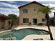 Home featuring a backyard pool, desert landscaping, patio, and stucco exterior at 6538 W Nez Perce St, Phoenix, AZ 85043