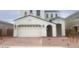 Beautful two story home with brick driveway and desert landscaping at 7668 W Nosean Rd, Peoria, AZ 85383