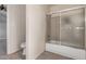 The bathroom features a glass-enclosed bathtub and tile floors at 845 N Oak Ct, Chandler, AZ 85226