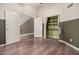 Bedroom with laminate flooring, and direct access to the stairs and closet at 845 N Oak Ct, Chandler, AZ 85226