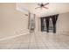 Spacious bedroom with tile flooring and sliding glass doors leading to the pool at 845 N Oak Ct, Chandler, AZ 85226