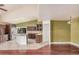 Open concept layout connecting the kitchen and living spaces for easy entertaining and Gathering living at 845 N Oak Ct, Chandler, AZ 85226