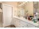Bathroom featuring white cabinets and countertops, providing ample storage space at 8603 E Aster Dr, Scottsdale, AZ 85260