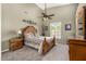 A beautifully styled bedroom with an ornate wooden bed, creating a warm and inviting atmosphere at 8603 E Aster Dr, Scottsdale, AZ 85260