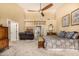 Bright main bedroom with a sitting area, and views of other areas of the house at 8603 E Aster Dr, Scottsdale, AZ 85260