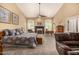 Spacious main bedroom with a fireplace, sitting area, and plenty of natural light at 8603 E Aster Dr, Scottsdale, AZ 85260